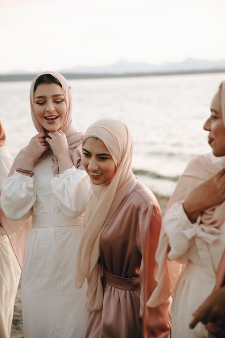 Group Of Women In White Hijab Smiling