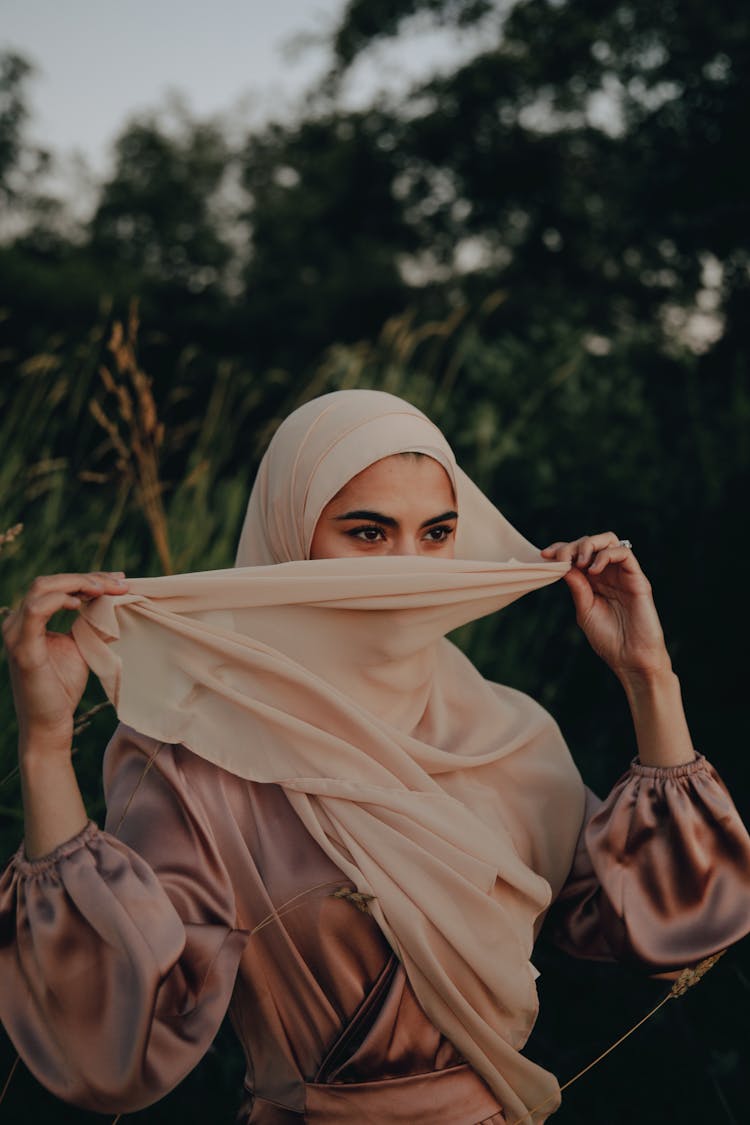 Woman Hiding Face With Hijab