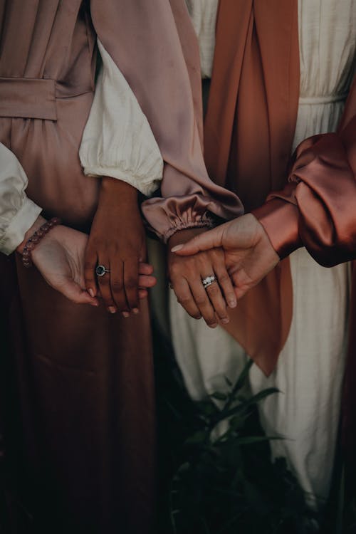 Women Holding Hands