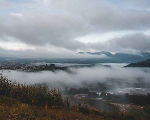 Gratis stockfoto met akkerland, bergen, gras