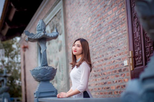 Woman Wearing White Blouse Looking at Sky