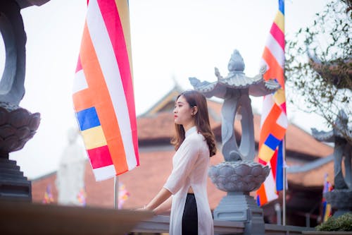 Photo of Woman Standing on Bridge