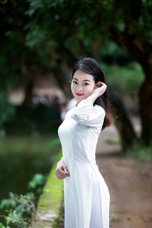 Woman Wearing White 3/4-sleeved Dress
