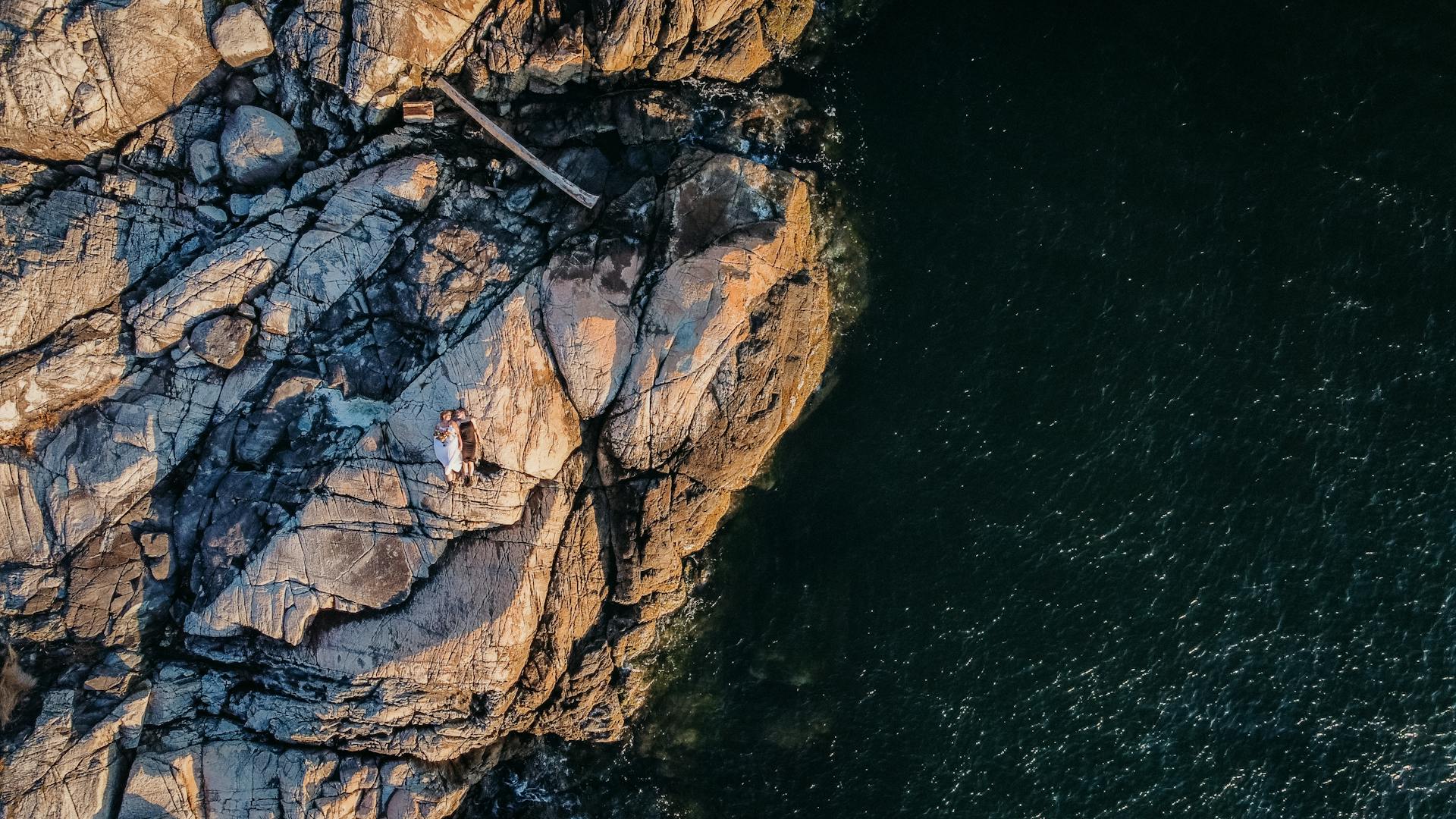 Drone shot capturing the rugged and scenic rocky coastline in West Vancouver, BC.