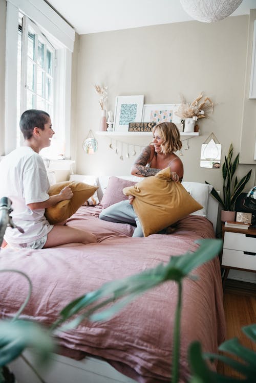 Women Having a Pillow Fight