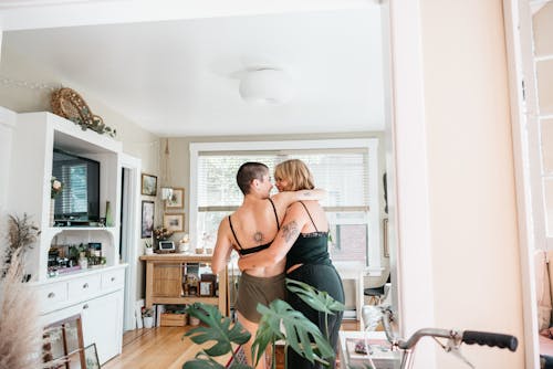 Free Women Embracing Each Other Stock Photo