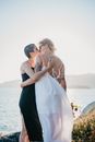 Couple Kissing Near the Ocean