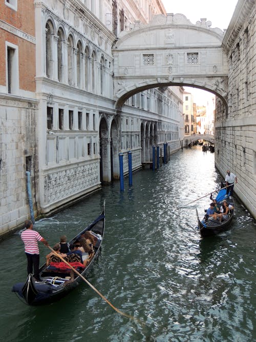 People Riding on Boat on River