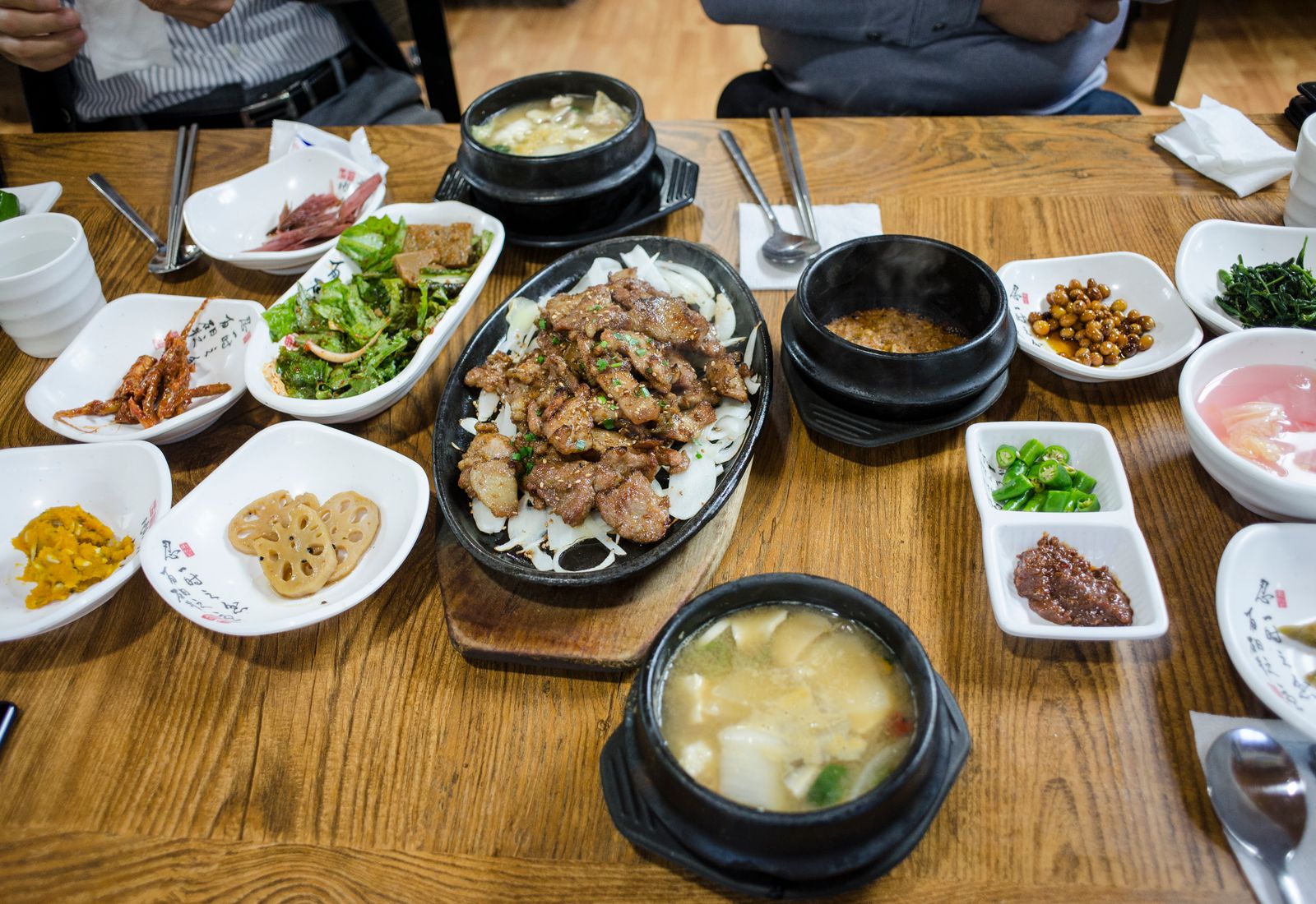Korean dinner spread with rice and banchan