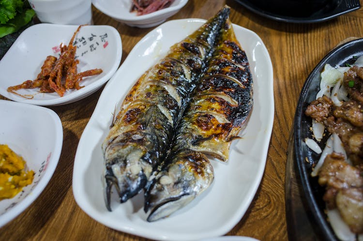 Cooked Fish On White Ceramic Plate