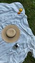 Brown Fedora Hat on White Textile