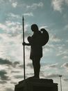 Silhouette of Amazon Woman Warrior Holding Spear and Shield