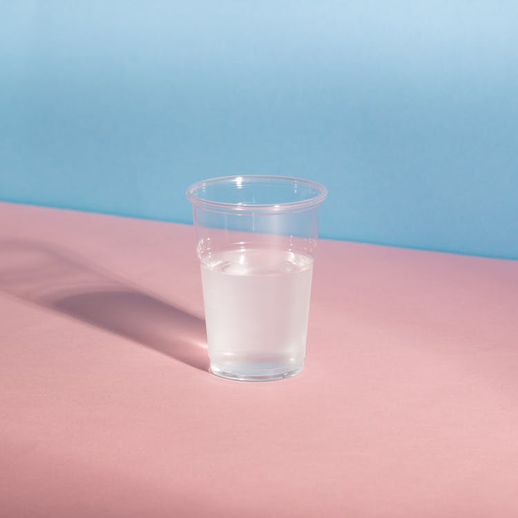 A Clear Plastic Cup With Water