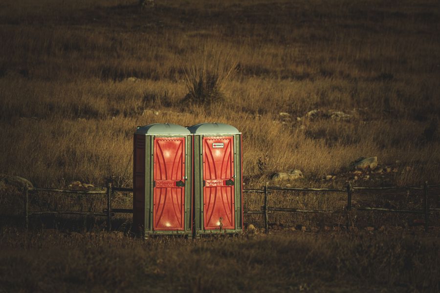 Portable restroom units in a field