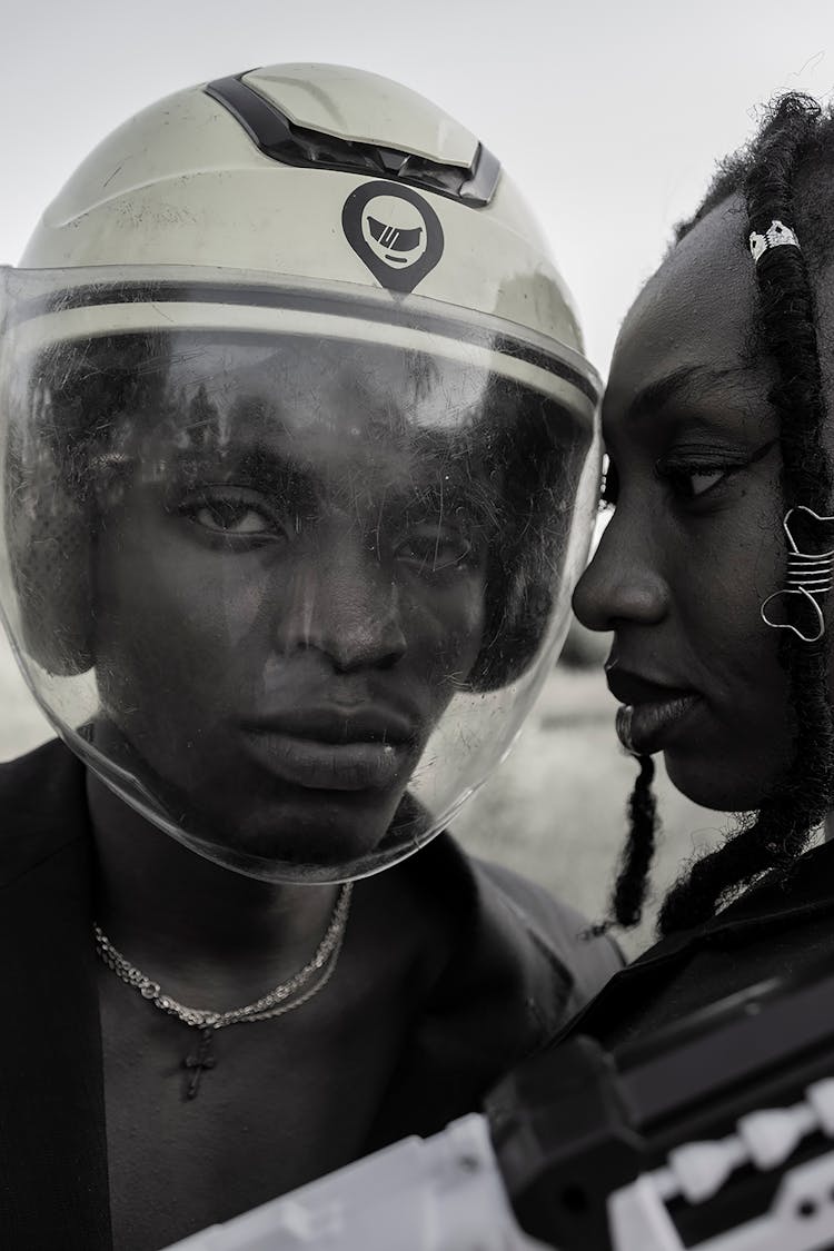 Black Man In Helmet And Shield On Face