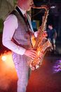 A Person Playing a Saxophone
