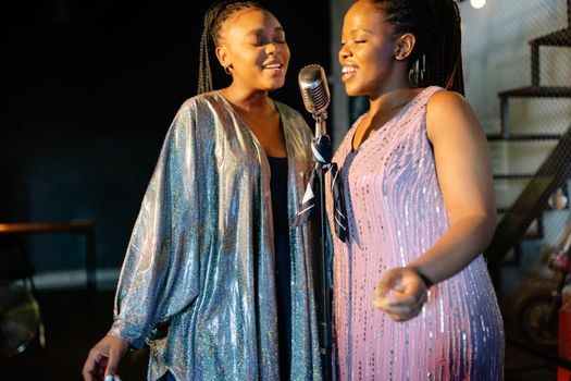 Female Singers Singing Together