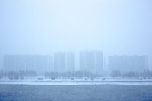 A City Near River on a Foggy Day