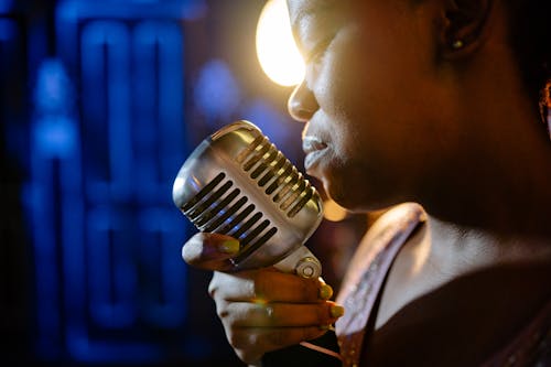 Free Close-Up of a Woman Singing  Stock Photo