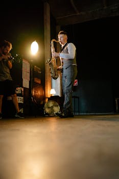 Saxophonist playing under a spotlight, capturing musical passion and atmosphere.