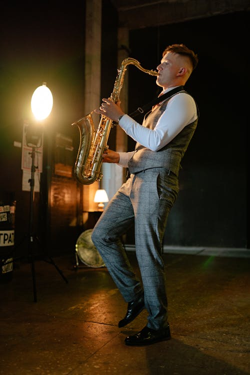 Photo of a Man Playing a Saxophone