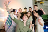 Group of People Taking a Photo