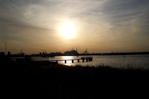 Gratis lagerfoto af havn, silhouet, solnedgang