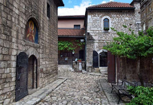 Courtyard with a Stone Orthodox Church