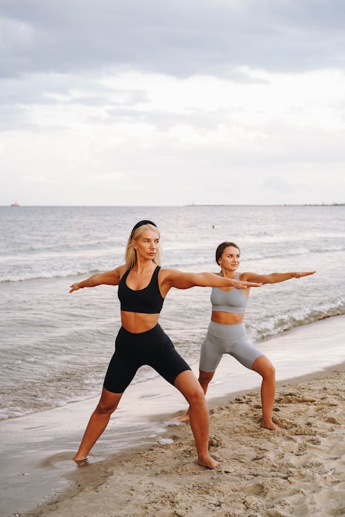 Women Exercising at the Beach