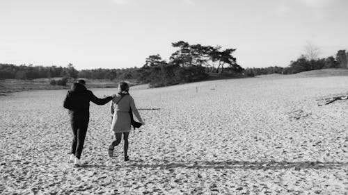 A Man and Woman Walking Together