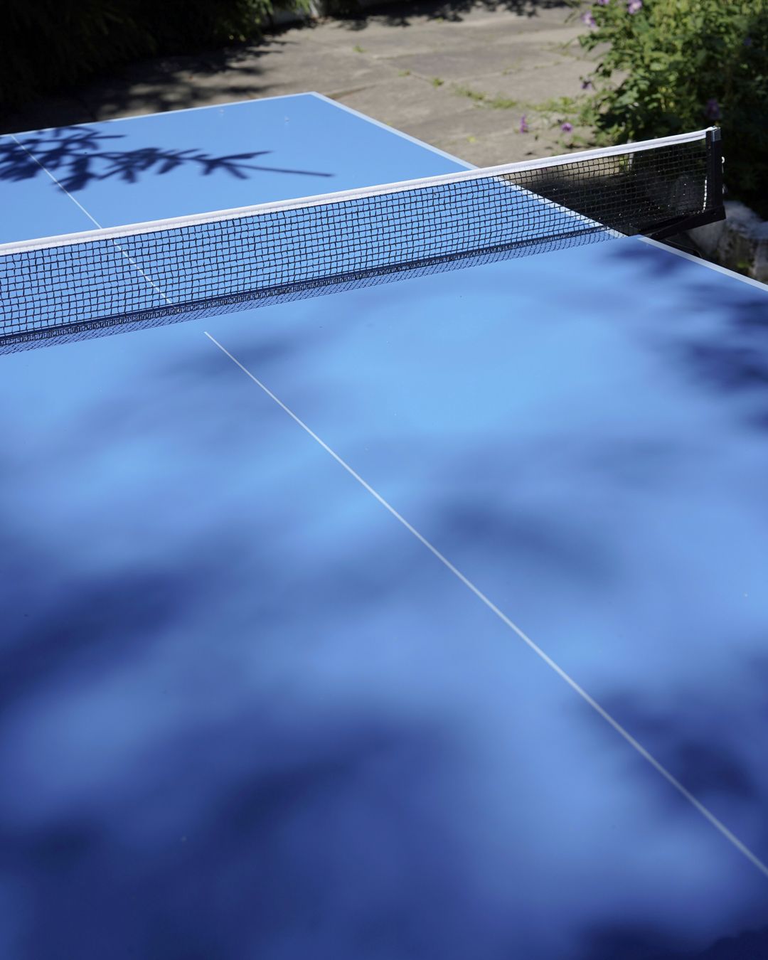 Table-tennis table by Spinmaster Tables in a sports hall