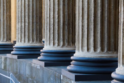 Close-up view of neoclassical columns in St. Petersburg, capturing architectural elegance.