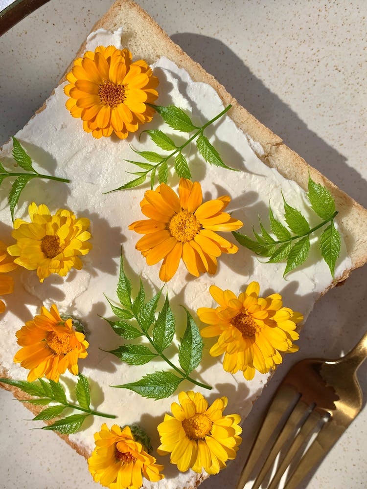 Yellow Flowers And Green Leaves