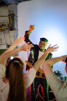 Energetic concert scene with a musician and cheering fans enjoying a vibrant performance.