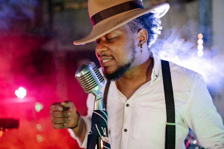 Close Up Photo Of A Man Singing