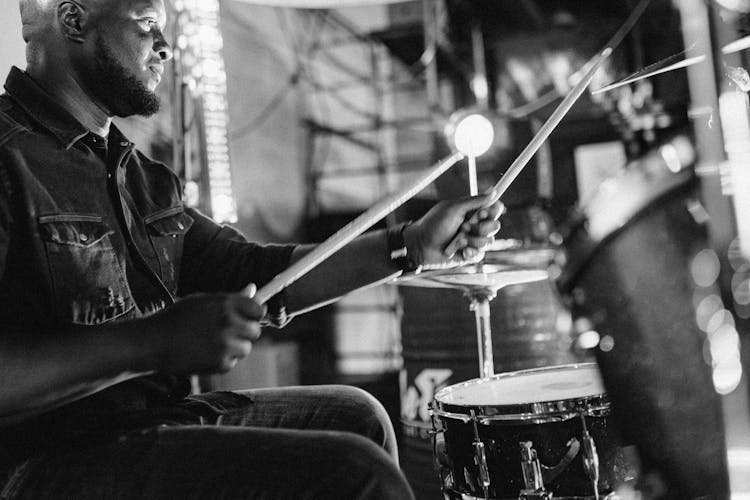 A Man Playing The Drums 