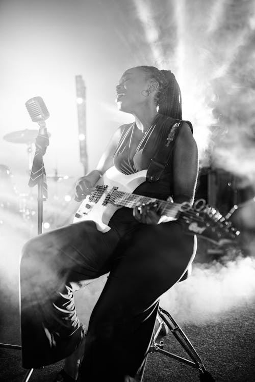 Man Playing Electric Guitar Grayscale Photo