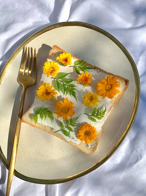 Free Bread with Leaves and Edible Flowers
 Stock Photo