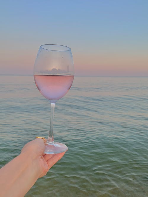 Free Wine Glass on Person's Hand Stock Photo