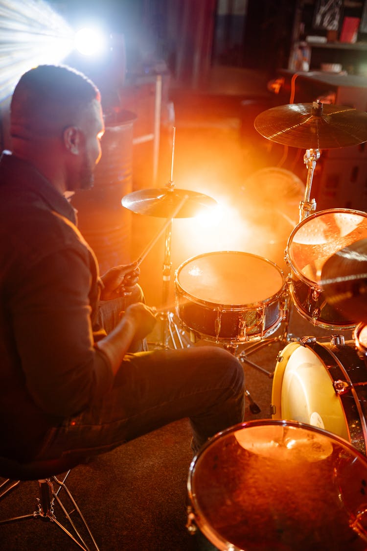 A Man Playing The Drums 