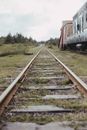 Red Train on Rail Tracks