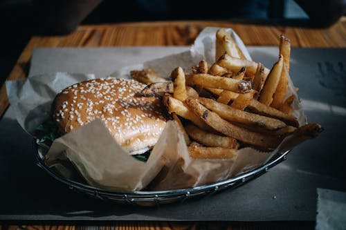 Free Hamburger and French Fries in a Serving Platter Stock Photo