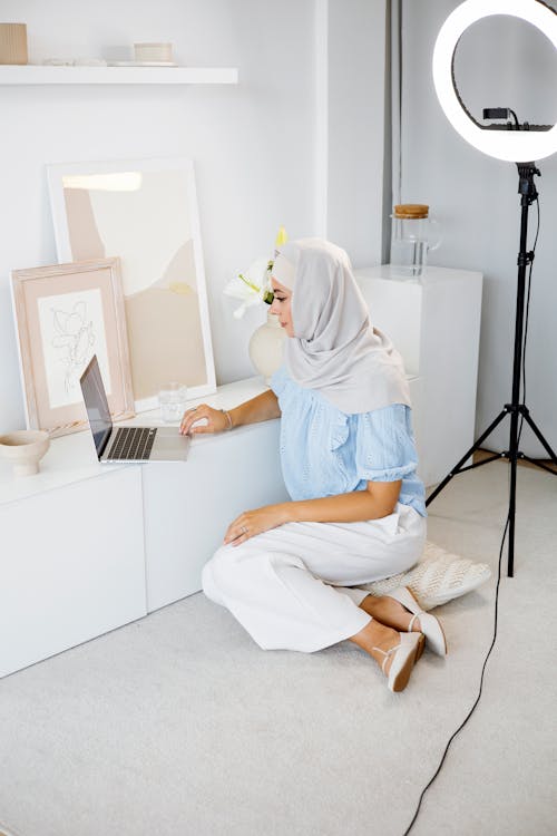 Free Woman in White Hijab using Gray Laptop  Stock Photo