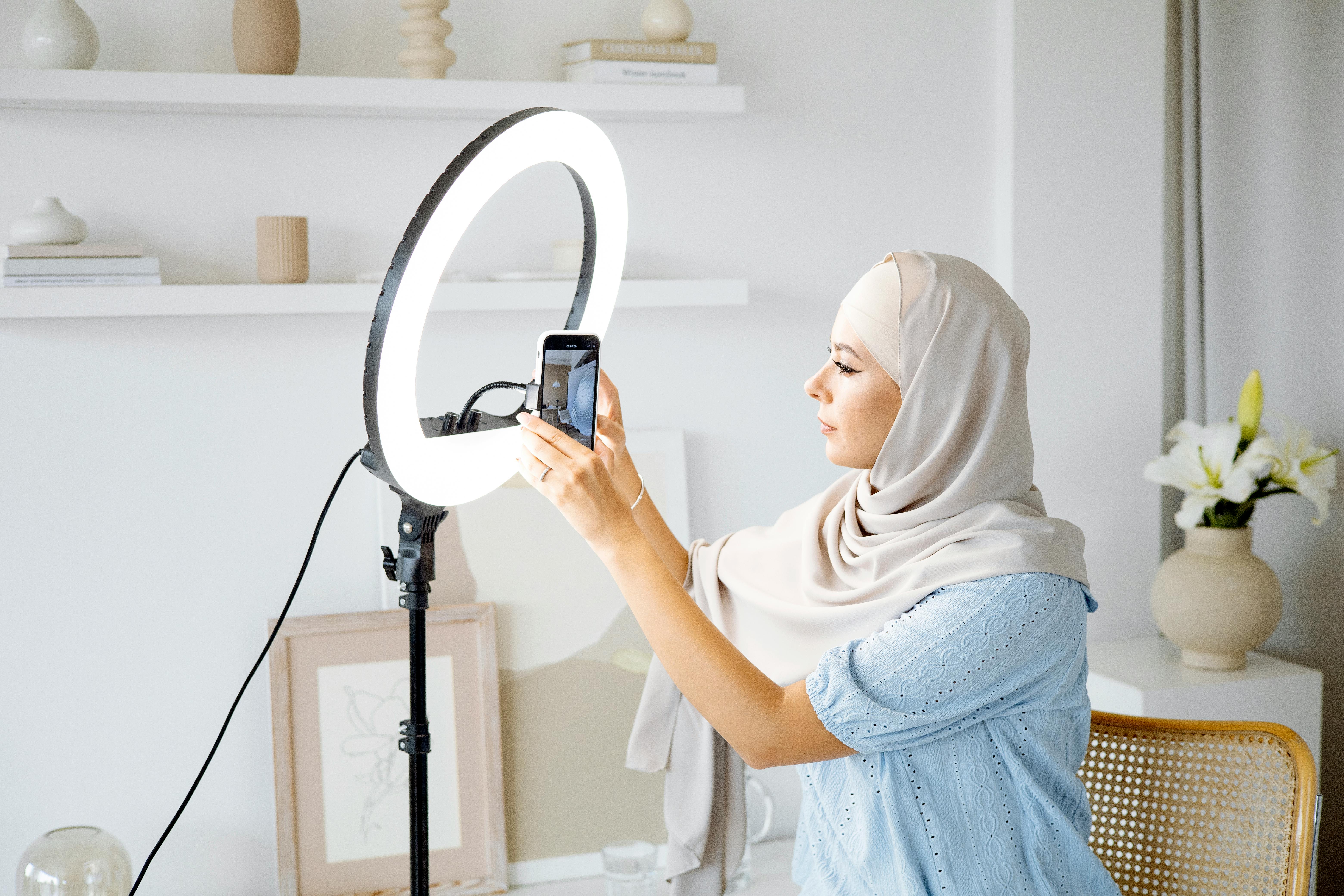 woman in front of a ring light