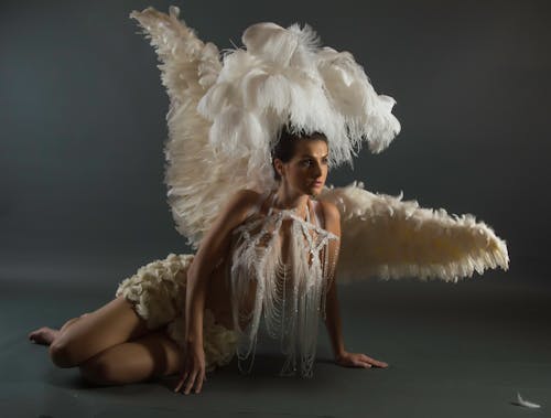 Woman in White Wings With Headdress