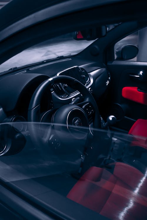Free A Black Steering Wheel Inside the Car Stock Photo