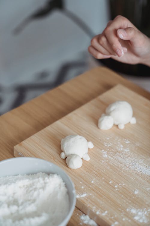 White Dough on Brown Wooden Chopping Board