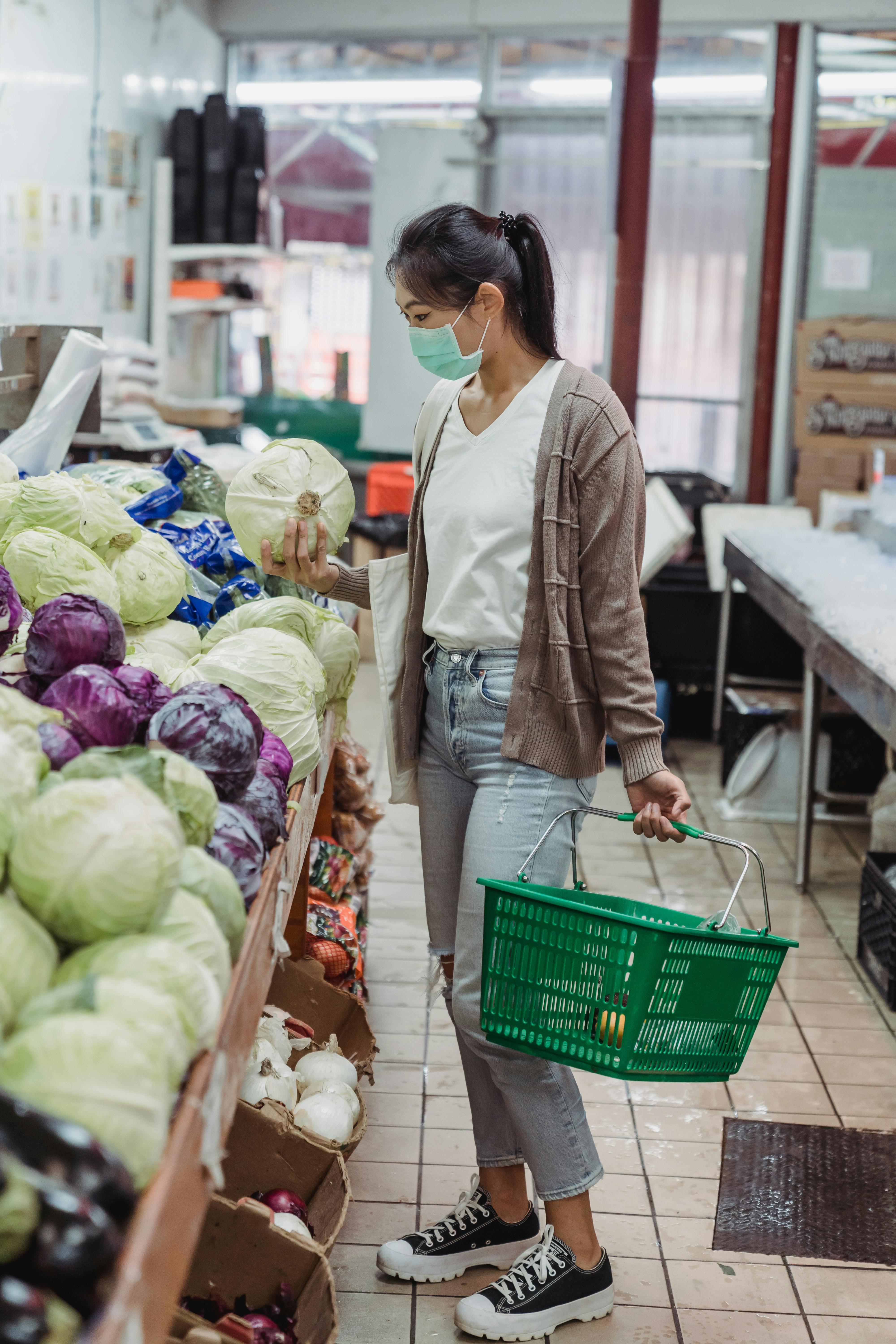 woman buying vegetables