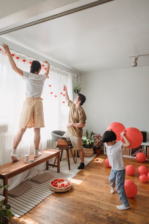 A Family Decorating their House