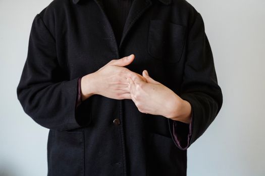 Engaging close-up of a person using sign language, showcasing hands in a signing gesture.